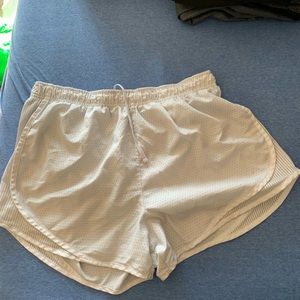 Size L Nike white running shorts